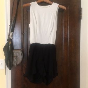 Ideal summer romper with open back.